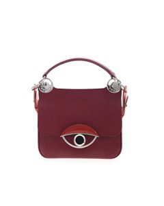 Medium Crossbody handbag in burgundy color